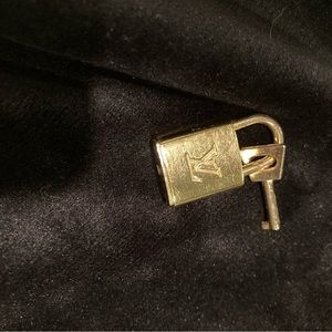 - Authentic Louis Vuitton lock and key